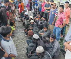  ?? AFP ?? Suspected Rohingya arrive in Idi Rayeuk, East Aceh, yesterday.