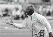  ?? AP Photo ?? Charlie Strong, here as head coach of Texas in 2014, will focus on linebacker­s in his new role with UM.