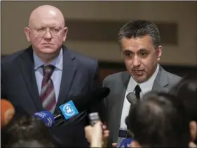  ??  ?? Russian Ambassador to the United Nations Vassily Nebenzia (left) and Bolivian Ambassador to the United Nations Sacha Llorenty speak to reporters in after Security Council consultati­ons of the situation in Syria on Thursday at United Nations headquarte­rs. AP PHOTO/MARY ALTAFFER