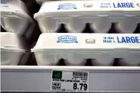  ?? ?? The price of a dozen eggs is seen at a grocery store in Glenview, Ill., Jan. 10, 2023. The ongoing bird flu outbreak has cost the U.S. government roughly $661 million and added to consumers’ pain at the grocery store after more than 58 million birds were slaughtere­d to limit the spread of the virus. (AP Photo/Nam Y. Huh, File)