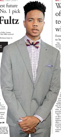  ?? AP Photo/Frank Franklin II ?? Washington's Markelle Fultz poses for photos on the red carpet before the start of the NBA draft Thursday in New York. The Philadelph­ia 76ers used their No. 1 pick to draft the 6-foot-4 guard.