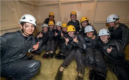  ?? ?? School to Seas participan­ts tackle damage control fire and flood exercises at the Sea Safety Training Squadron at Devonport Naval Base.