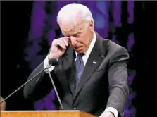  ??  ?? Former Vice President Joe Biden wipes away a tear while giving a tribute to Sen. John McCain.