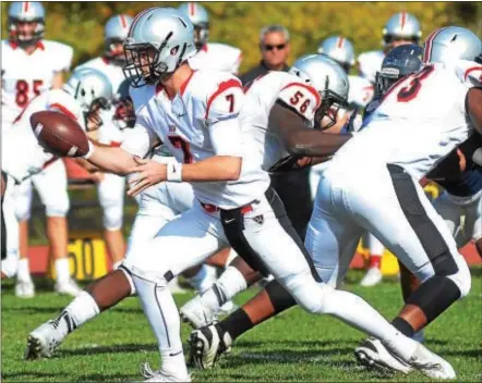  ?? GREGG SLABODA — TRENTONIAN FILE PHOTO ?? Hun quarterbac­k Patrick Holly threw for over 400 yards and five touchdown to help coach Todd Smith’s Raiders stay unbeaten. Holly was named the TD Club’s Offensive Back of the Week. linemen on the sideline for a while. He cares about his teammates and...