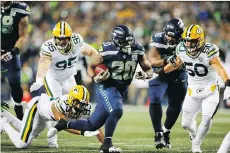  ?? OTTO GREULE JR./GETTY IMAGES ?? Despite playing on an injured ankle, Seahawks’ rookie running back Rashaad Penny rambled for 46 yards on eight carries against the Packers on Thursday night.