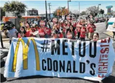  ?? AP FILE PHOTO BY RICHARD VOGEL ?? McDonald’s workers march toward a McDonald’s in south Los Angeles. Roughly a third of American workers say they’ve changed how they act at work in the past year, as the #MeToo movement has focused the nation’s attention on sexual misconduct.