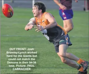  ?? Picture: PAUL CARRACHER ?? OUT FRONT: Josh Bromley-lynch worked hard for the Giants but could not match the Demons in their 94-36 loss.