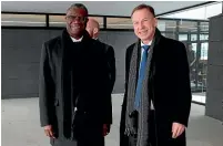  ?? AP ?? Dr Denis Mukwege, left, is welcomed by director of the Norwegian Nobel Institute Olav Njolstad on his arrival at Oslo Airport in Gardermoen, Norway.