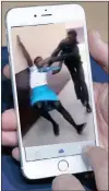  ??  ?? SCHOOL BULLY: A video showing a schoolgirl being assaulted at Siyathuthu­ka High School in Inanda.