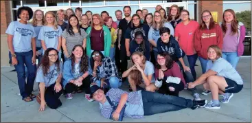  ??  ?? Heritage High School media specialist Rhonda Sixto (far left) arranged for award-winning author Jeff Zentner (middle, with beard) to conduct a writing workshop for students. (Catoosa News photo/Tamara Wolk)