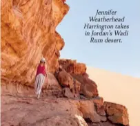 ??  ?? Jennifer Weatherhea­d Harrington takes in Jordan’s Wadi Rum desert.