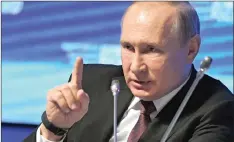  ?? ALEXEI NIKOLSKY AP ?? RUSSIAN President Vladimir Putin places a high premium on geopolitic­al relations and the pursuit of Russian assertiven­ess in the global arena. I