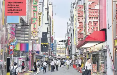  ??  ?? Tokyo’s Akihabara district, a hub for electronic­s, game, anime and manga shops.
