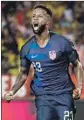  ?? Mike Ehrmann Getty Images ?? KELLYN ACOSTA of the U.S. celebrates a goal that tied the score 1-1.