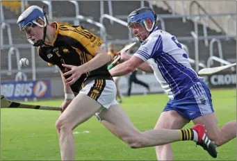  ??  ?? County Minor Liam Stafford (Adamstown) is pursued by Craanford’s Michael O’Loughlin.