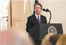  ?? Andrew Harrer / Bloomberg ?? Brett Kavanaugh speaks after being nominated as an associate justice of the U.S. Supreme Court by President Trump.