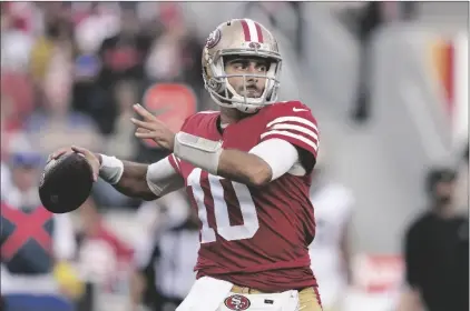  ?? AP PHOTO/GODOFREDO A. VÁSQUEZ ?? San Francisco 49ers quarterbac­k Jimmy Garoppolo (10) passes against the New Orleans Saints during the second half of an NFL football game on Nov. 27, 2022, in Santa Clara, Calif.