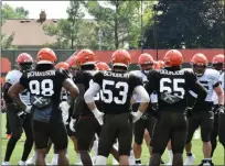  ?? PAUL DICICCO — FOR THE NEWS-HERALD ?? The Browns’ defense, including Sheldon Richardson, Joe Schobert and Larry Ogunjobi, prepares to line up for a snap July 29 in Berea.