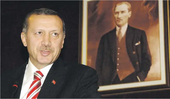  ?? Picture: AFP ?? ANOTHER TERM. Turkish Prime Minister Recep Tayyip Erdogan, standing in front of a portrait of modern Turkey’s founder Mustafa Kemal Ataturk, has secured another five years in office.