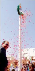  ??  ?? Indian Consul-General Vipul hoists national flag at the consulate in Dubai.