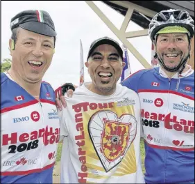  ?? LYNN CURWIN/TRURO NEWS ?? Heartland Tour organizers, from left, Nick Giacomanto­nio, Raj Makkar and Carman Giacomanto­nio, were happy to see a record crowd out for this year’s stop in Truro yesterday.