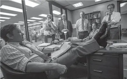  ?? Tribune News Servie ?? From left, Tom Hanks (Ben Bradlee), David Cross (Howard Simons), John Rue (Gene Patterson), Bob Odenkirk (Ben Bagdikian), Jessie Mueller (Judith Martin) and Philip Casnoff (Chalmers Roberts) in a scene from the movie “The Post.”