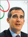  ?? Jean-christophe Bott ?? The Associated Press Los Angeles Mayor Eric Garcetti said Monday the city has reached an agreement with internatio­nal Olympic leaders that will open the way for L.A. to host the 2028 Summer Games, while ceding the 2024 Games to rival Paris.