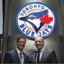  ?? NATHAN DENETTE/THE CANADIAN PRESS FILE PHOTO ?? The departure of Canadian GM Alex Anthopoulo­us, a fan favourite, and the arrival of Mark Shapiro’s replacemen­t for him, Ross Atkins, left, has cast Shapiro as a villain in the minds of some Blue Jays fans.