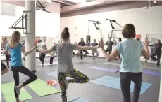 ??  ?? Yoga for Peace at the YMCA.