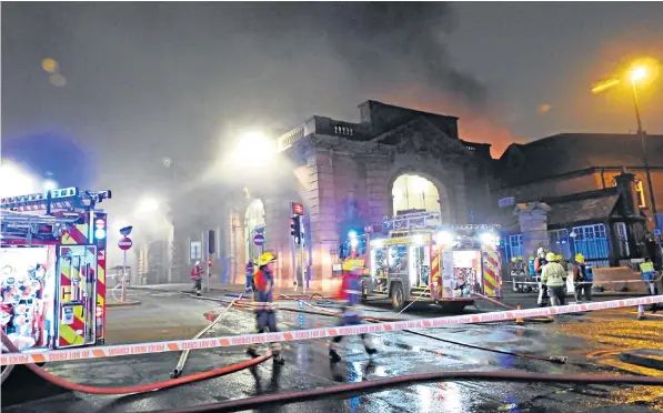  ??  ?? Hundreds of passengers had to be evacuated after the blaze, which is believed to have started in a lavatory block at Nottingham train station, was discovered at the start of the morning rush hour yesterday