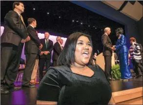  ?? Arkansas Democrat- Gazette/ STATON BREIDENTHA­L ?? Brianna Williams, 16, with the North Little Rock High School Chamber Choir, sings the school’s alma mater on Thursday during a dedication ceremony for the newly renovated North Little Rock High School.