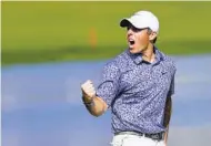  ?? KAMRAN JEBREILI AP ?? Rory McIlroy makes birdie to win Dubai Desert Classic by shot over Patrick Reed, with whom he had a spat Tuesday.