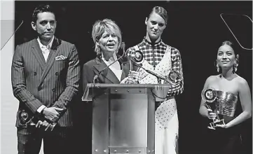  ??  ?? ‘Terminator: Dark Fate' cast members (Left-Right) Gabriel Luna, Linda Hamilton, Mackenzie Davis, and Natalia Reyes, accept the CinemaCon Ensemble Award, during the CinemaCon Big Screen Achievemen­t Awards ceremony at Caesars Palace in Las Vegas, Nevada, US THursday. — Reuters photo