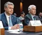  ?? Mark Schiefelbe­in/AP ?? FBI Director Christophe­r Wray, left, and CIA head William Burns said they would look into releasing materials on surveillan­ce.