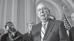  ?? J. SCOTT APPLEWHITE/AP FILE ?? Senate Minority Leader Mitch McConnell said the isolationi­st faction in the GOP “won’t create a problem; we’ll get the job done.”