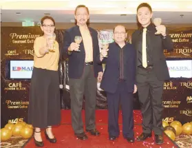  ?? SUNSTAR FOTO / ALLAN DEFENSOR ?? NEW LINE. Celebratin­g the launch of Edmark’s new line of premium gourmet coffees are ( from left) Edmark chief marketing officer Lynden Valdez, chief executive officer Ric Camaligan, operations and planning manager Jimmy Dirio and Yee Ming Low, the son...