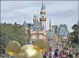  ?? Jae C. Hong Associated Press ?? DISNEYLAND’S property tax would go up, but the tax for most California­ns would not.