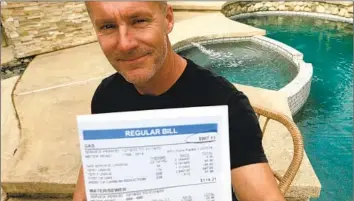  ?? Luis Sinco Los Angeles Times ?? BRENT ELDRIDGE, 48, of Long Beach received a $907.13 gas bill in January, eight times higher than last January’s. “It made me want to puke,” he said of the bill, which he attributes to running his whirlpool spa.