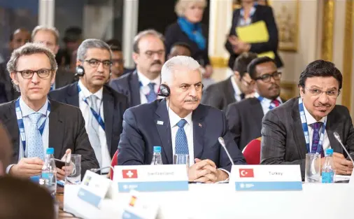  ??  ?? Turkey’s Prime Minister Binali Yildirim takes part in the Somalia Conference in London. The conference was aimed at improving stability and prosperity in Somalia. (AP)