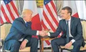  ?? AFP FILE ?? ▪ Donald Trump and Emmanuel Macron at a meet in Brussels.