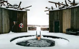  ??  ?? VIEW TO A CHILL: The ice-cold Arctic Bath and two of its saunas