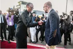  ??  ?? Kagame (left) welcomes Michel who will attend the 25th Commemorat­ion of the 1994 Genocide against the Tutsi at Kigali internatio­nal airport in Kigali, Rwanda. — AFP photo