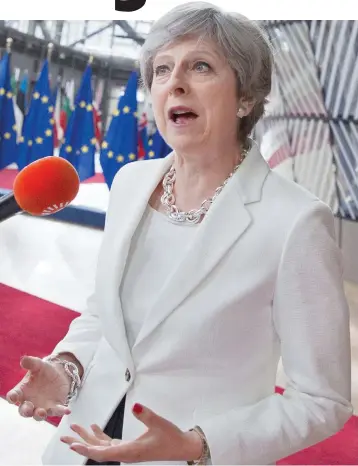  ??  ?? Standing firm: Prime Minister Theresa May speaking to the media yesterday