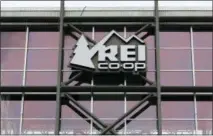  ?? TED S. WARREN — THE ASSOCIATED PRESS FILE ?? This file photo shows the REI flagship store in Seattle. Camping can be an affordable vacation option, but costs can add up after buying equipment and booking a campsite or renting an RV. REI has an Anniversar­y Sale each May. You’ll also traditiona­lly...