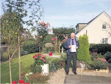  ??  ?? Green-fingered great Ron in his award-winning Chryston garden