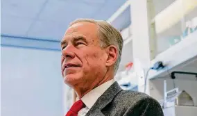 ?? Raquel Natalicchi­o/Staff photograph­er ?? Gov. Greg Abbott has banned TikTok, which is owned by a Beijing-based company, from state-issued devices and public universiti­es across Texas.