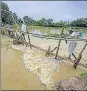  ?? PTI ?? Villagers use a makeshift bamboo bridge in Nagaon.