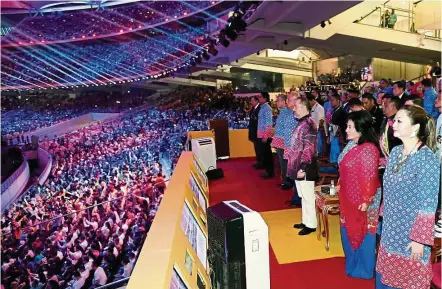  ??  ?? Sultan Muhammad V with Prime Minister Datuk Seri Najib Tun Razak at Stadium Nasional Bukit Jalil in Kuala Lumpur for the KL 2017 SEA Games opening ceremony on Aug 19. — Bernama