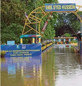 ?? (Foto BERNAMA) ?? Sebanyak 8 sekolah di Perlis akan ditutup susulan banjir.