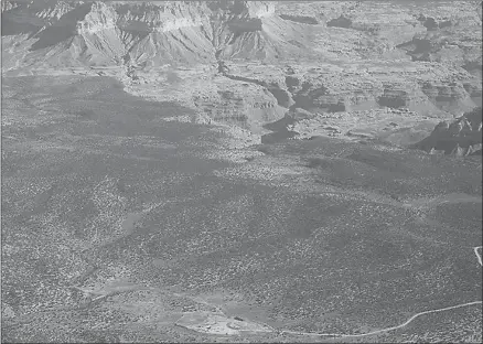  ?? CAITLIN O’HARA / THE NEW YORK TIMES ?? The shuttered Pinenut uranium mine, bottom, near the North Rim of the Grand Canyon in Arizona, is seen Dec. 7. Despite pollution concerns and emboldened by the Trump administra­tion’s embrace of corporate interests, the uranium mining industry is renewing a push into the areas adjacent to the Grand Canyon watershed and the Bears Ears National Monument.